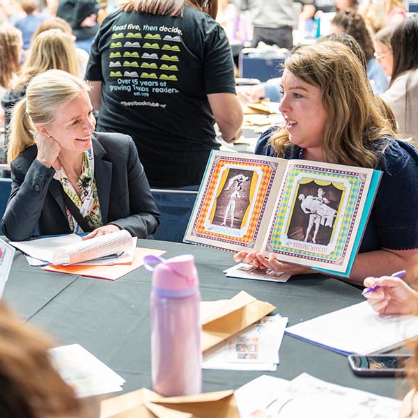 TLA 2026 Texas Bluebonnet Award Speed Dating event with two female attendees