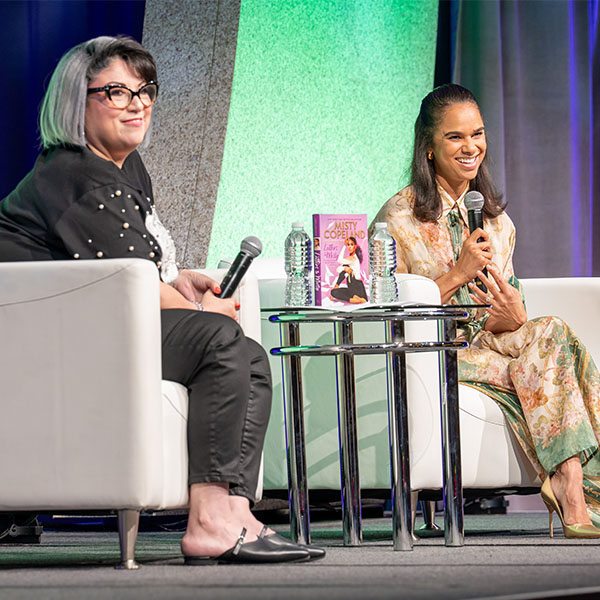 Misty Copeland-TLA 2025 Keynote sitting in a chair with interviewer on stage at TLA's Annual Conference