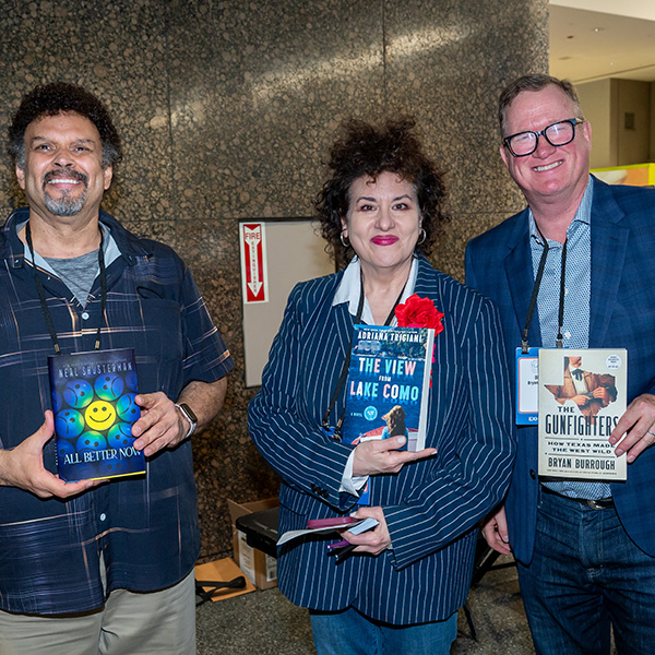 TLA 2025 Opening Authors Session with Neal Shusterman, Adriana Trigiani, and Bryan Burrough standing with their books