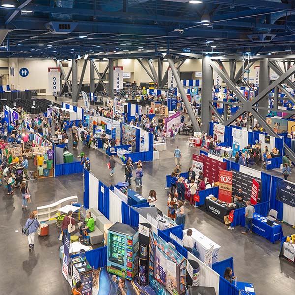 TLA 2026 Exhibit Hall from above with rows of booths